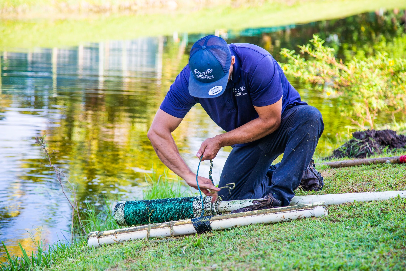 Technician checking irrigation system components